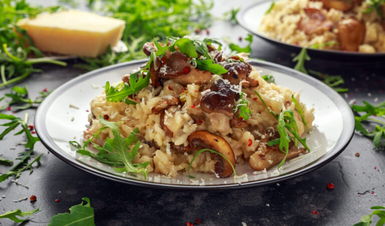 Italian Mushroom risotto with parmesan cheese and wild rocket on top